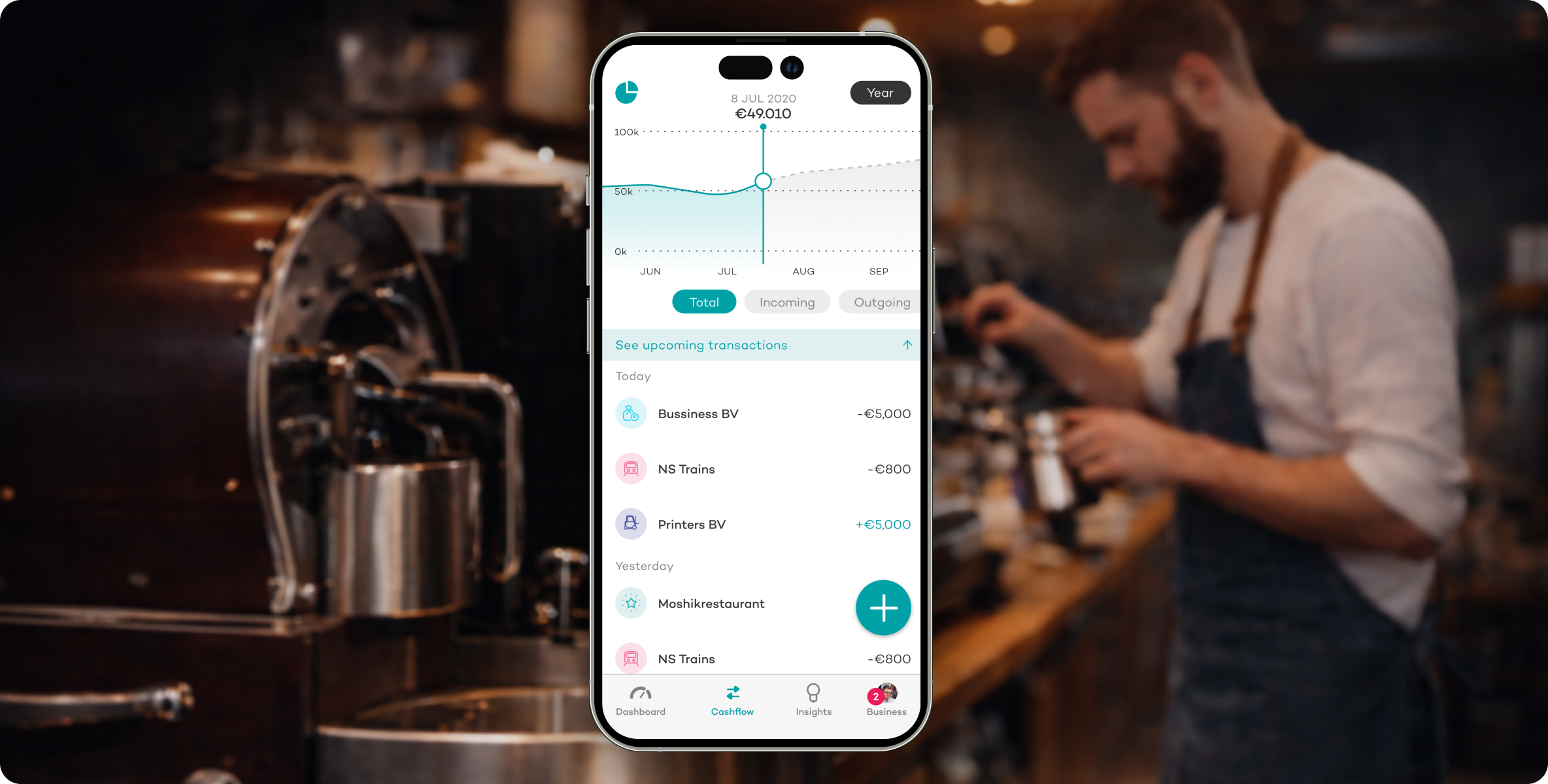 Rabobank SMB finance app shown on an iPhone against a small-business setting
